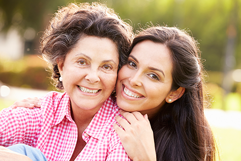 two smiling women